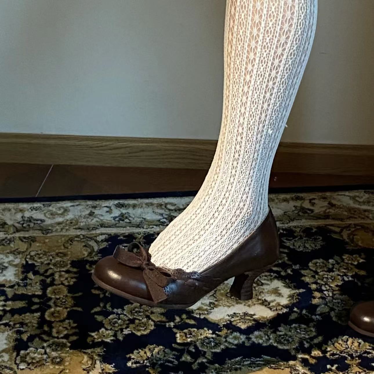 Fine heels with bow ties, paired with a skirt, are a perfect match for a simple open-toe sandal - Image 2