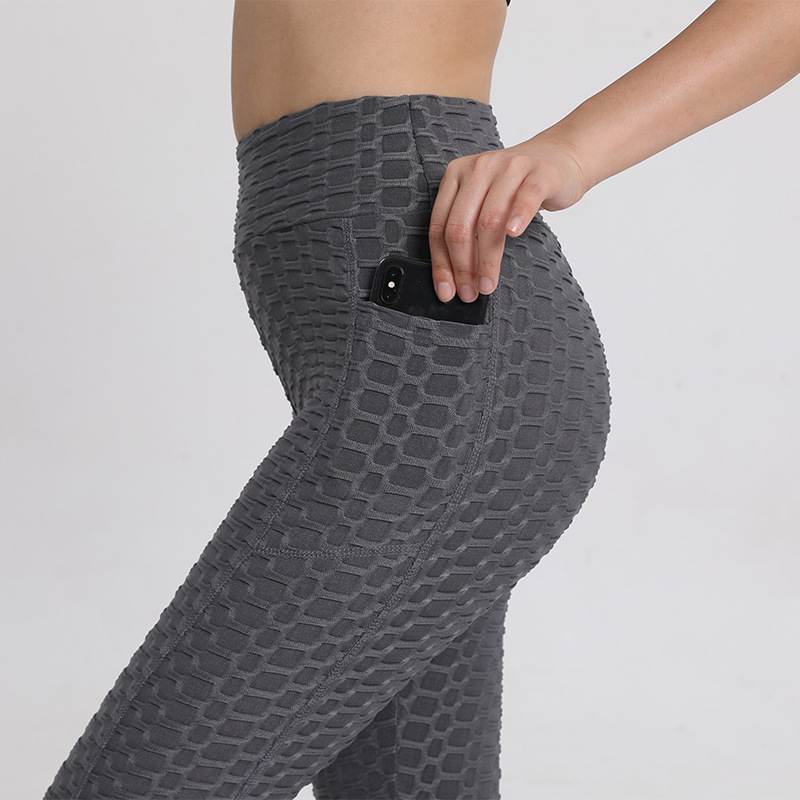Tight-fitting pants, peach-colored fitness pants