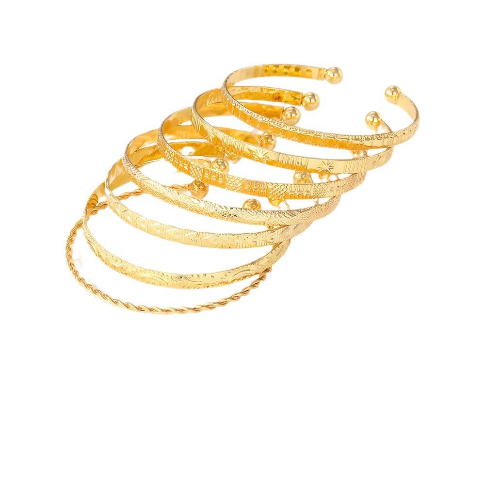 7-Piece Braided Open Bracelet Set with Star and Geometric Patterns - Image 3
